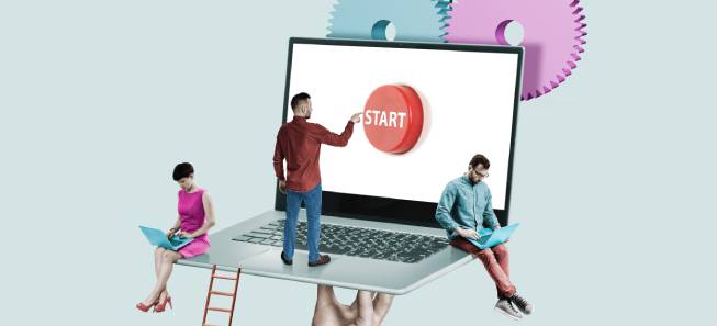 Image of a hand holding a laptop with a start button on the screen and startup businessman sitting on it with their laptops.